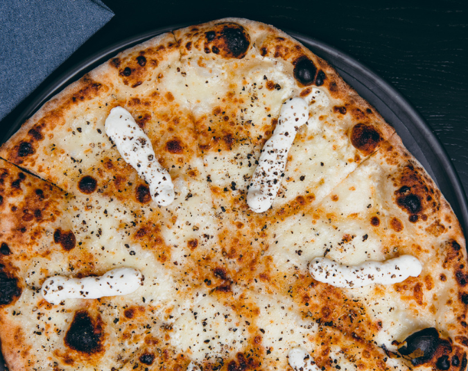 CACIO E PEPE - OUR SIGNATURE PIZZA